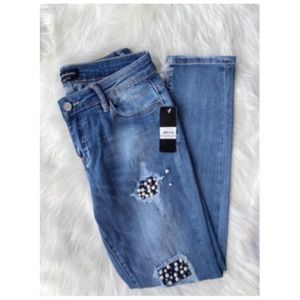 BEBE DISTRESSED SKINNY JEANS WITH FAUX PEARLS